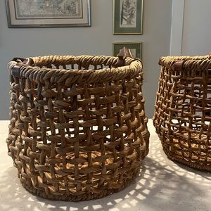 Two cute crate and barrel baskets for blankets, etc.